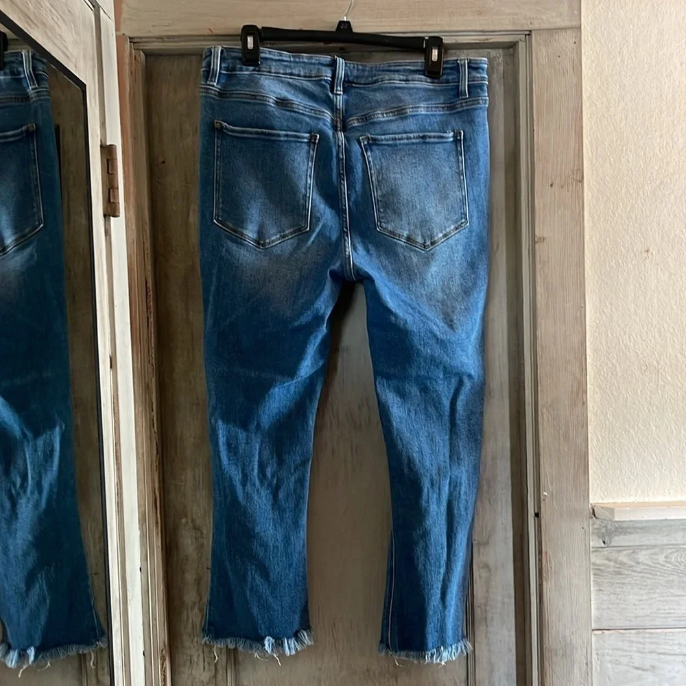 Haute Curve - distressed blue cropped with raw hem jeans - size 18